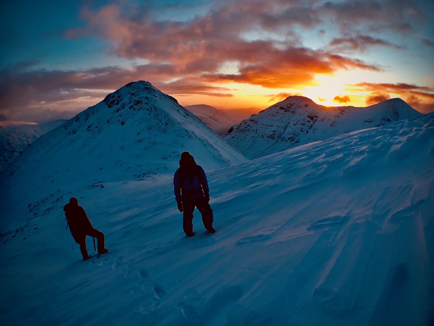 Winter Mountaineering Adventure With Sunrize Over Glen Coe, Scotland, With Ocean Vertical